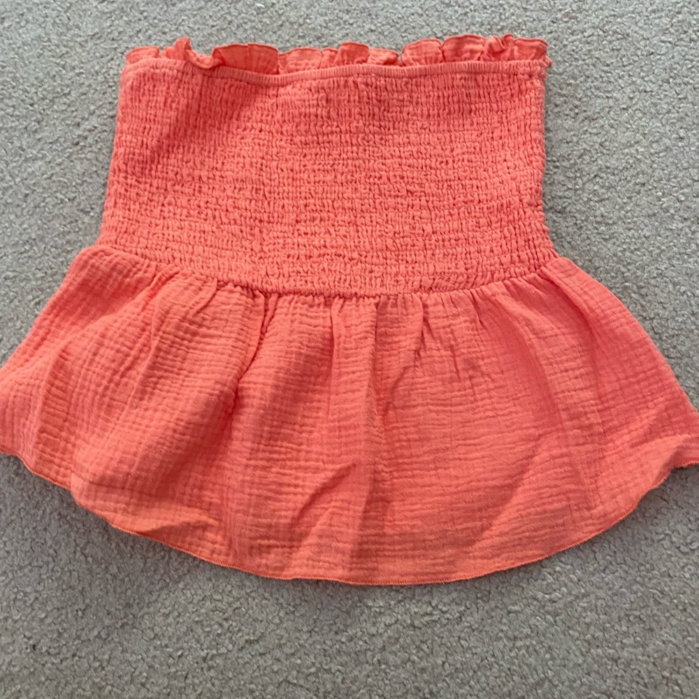 orange ribbed flowy top